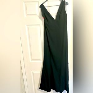 Women’s dark green floor length gown.